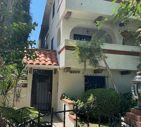 Security Gate door to inner property. Each Unit has a speaker system to allow guests in.