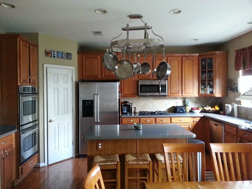 Gourmet Kitchen w/ Stainless Appliances and Corian Counterto