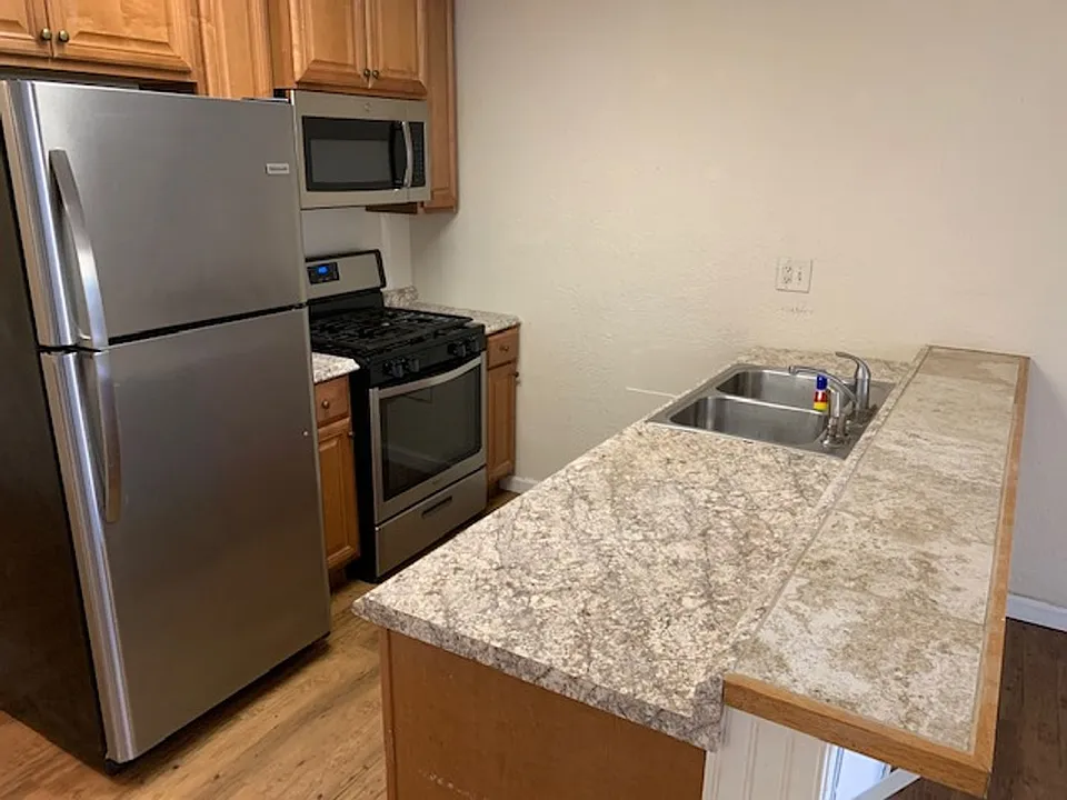 Updated 2BD/1BA Apartment with In-Unit Laundry + 2 Parking Spots - 1/2 Off Second Month's Rent