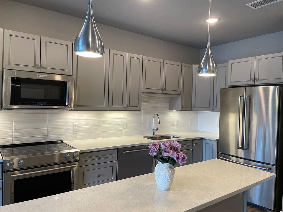 Kitchen with double door refrigerator