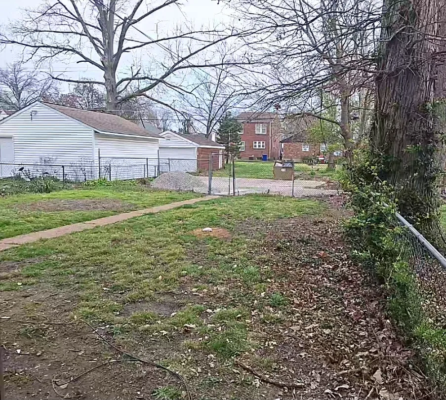 Both sides of the backyard are clear. Grass coming this spring. - 6723 Crest Ave #1