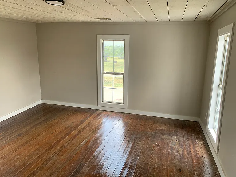 Original Hardwood and Shiplap in both upstairs bedrooms