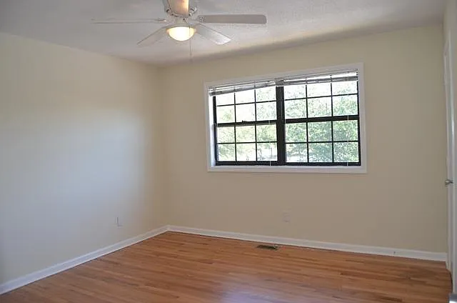 One of 2 upstairs bedrooms-both are BIG & both have ceiling fans.