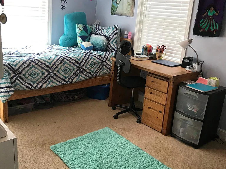 Upstairs corner bedroom on front of house.