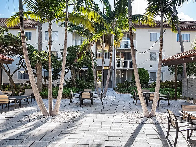 Lush landscaping and fountains throughout
