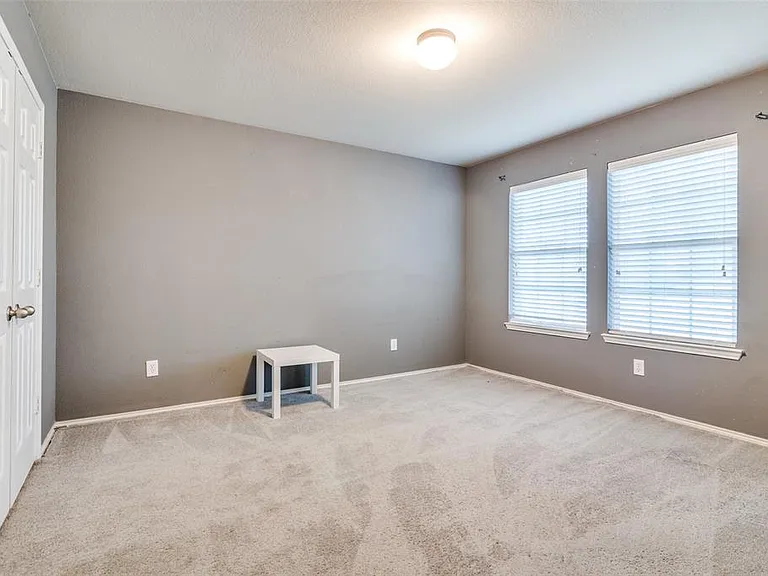 Unfurnished room with carpet floors
