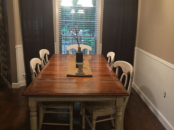 Dining room with hardwood 