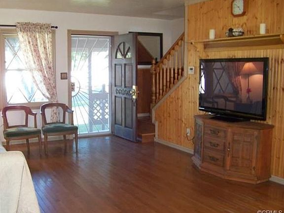 Spacious living room with beautiful wood floors.