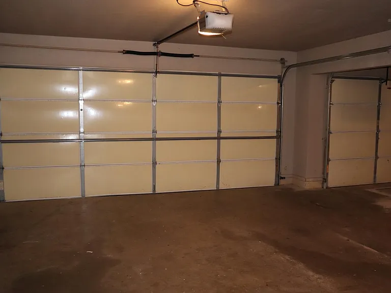 3 car garage with storm shelter