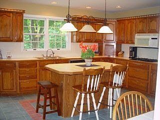 Kitchen with island breakfast bar seating