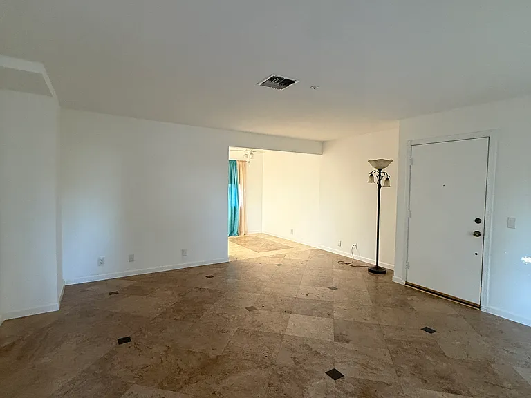 View of living room from stairs