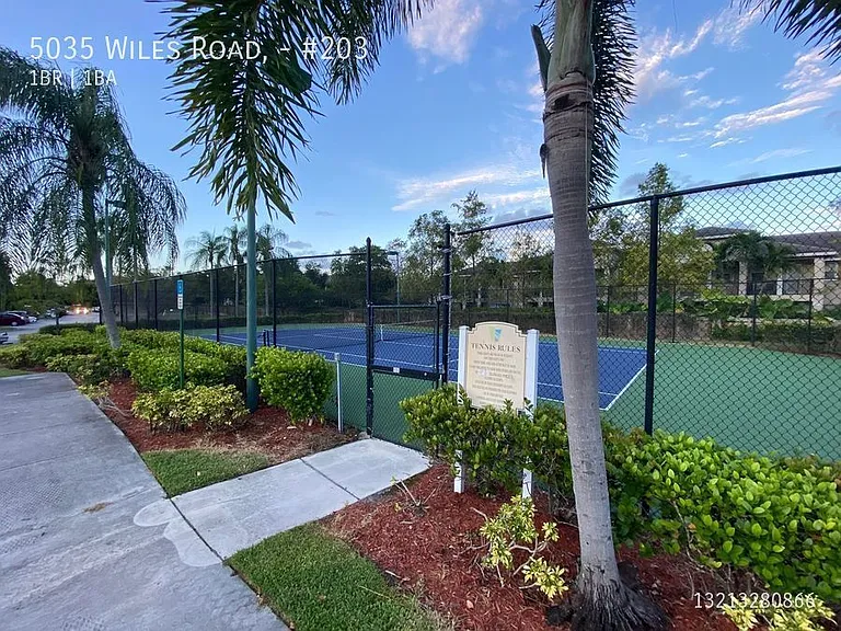 5035 Wiles Rd #203 — Photo 35