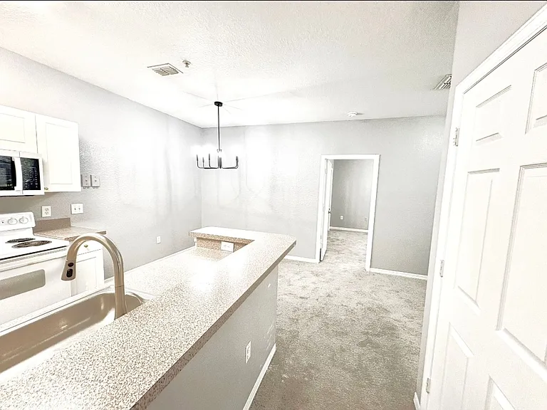 819 Grand Regency Pointe #100 — Photo 6