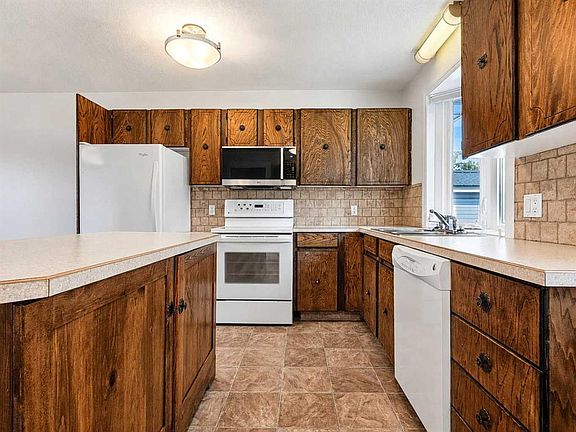 5th image of 10625 W 105th Ave