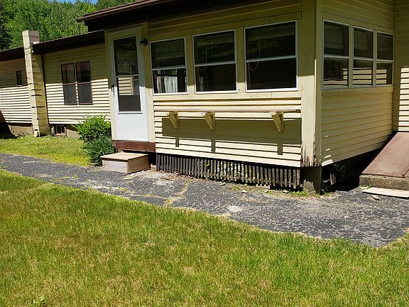BACK SIDE SHOWING PORCH