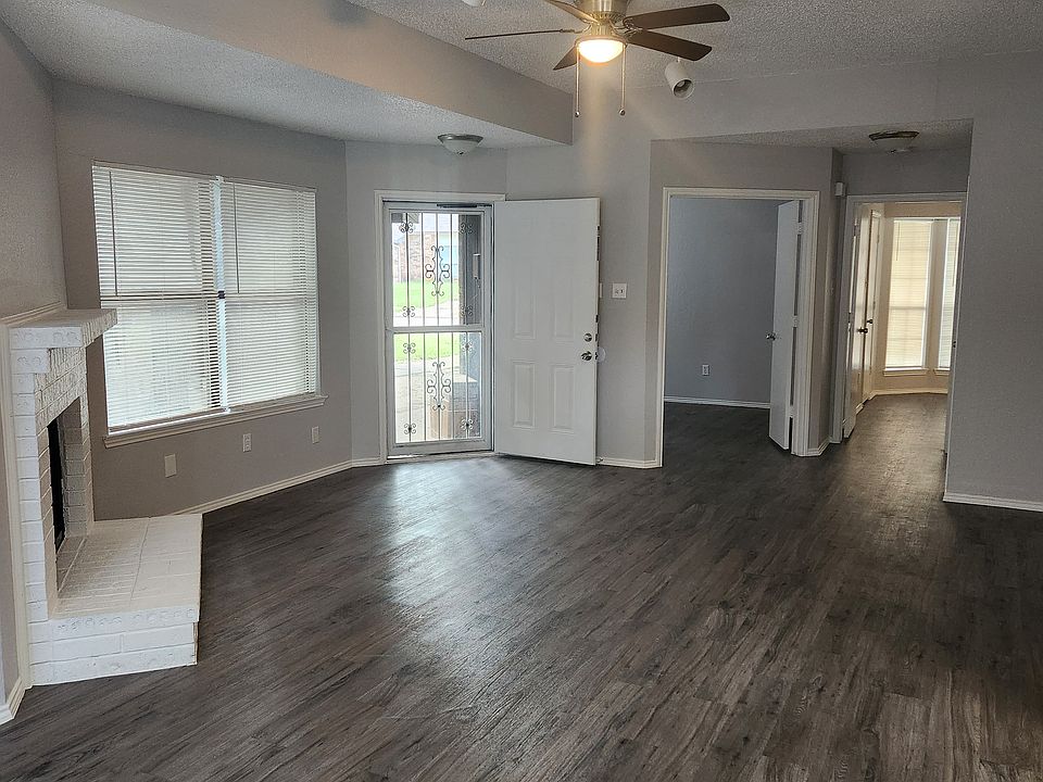 Living room looking towards the front door and bedrooms.