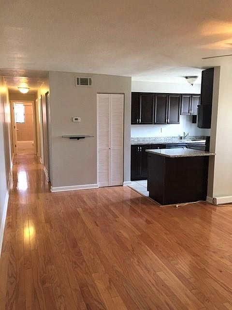 Spacious living room into kitchen