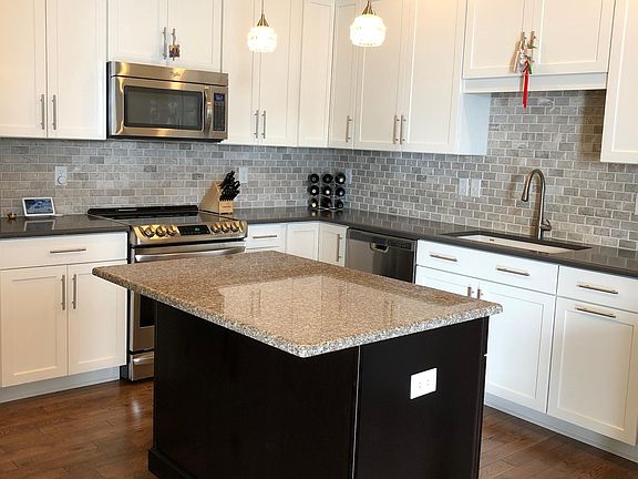Kitchen with induction range.