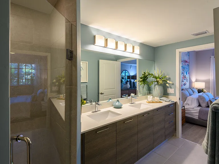 Glass door shower in select bathrooms