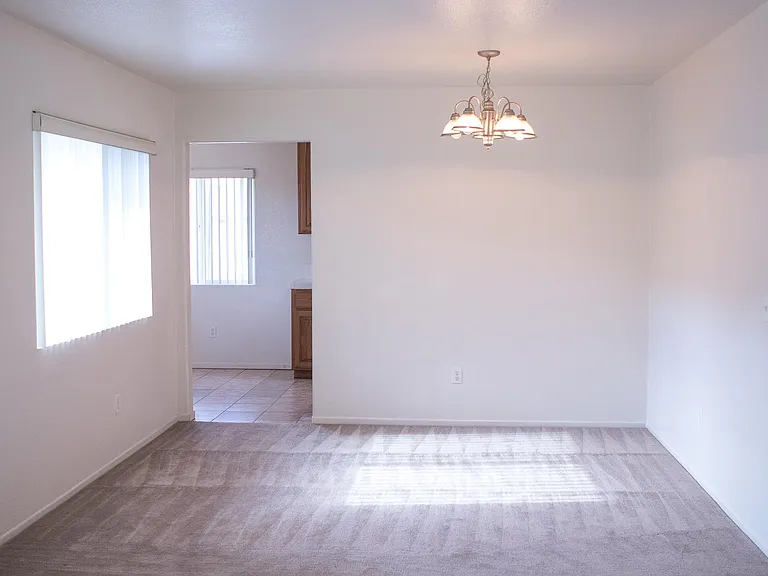 Dining room (open to living room space) or use as office space. Leads to kitchen