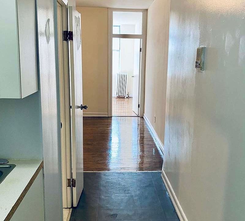 1st image of 114 E 1st St APT 15A