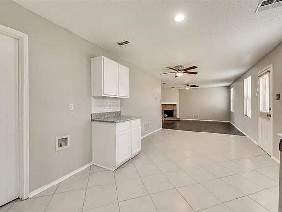 Extra cabinet storage between kitchen and breakfast room.