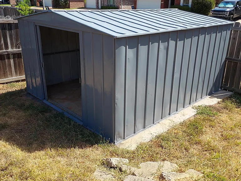 Storage shed with cement floor