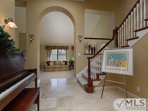 Elegant Entry with Natural Travertine Stone Floors