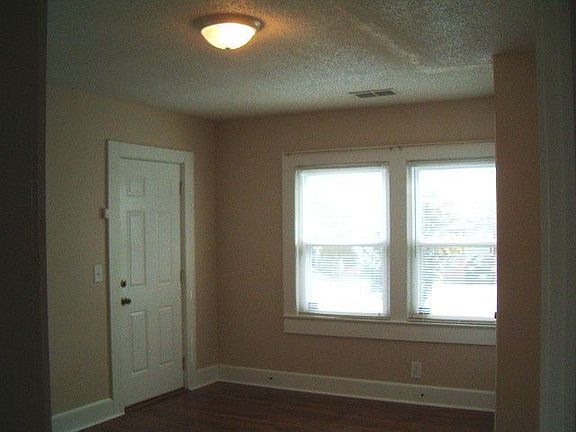 Bonus, bedroom or Den, exterior door opens onto covered porch