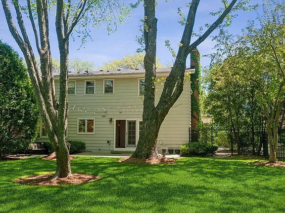 West facing with concrete patio, cantilevered umbr