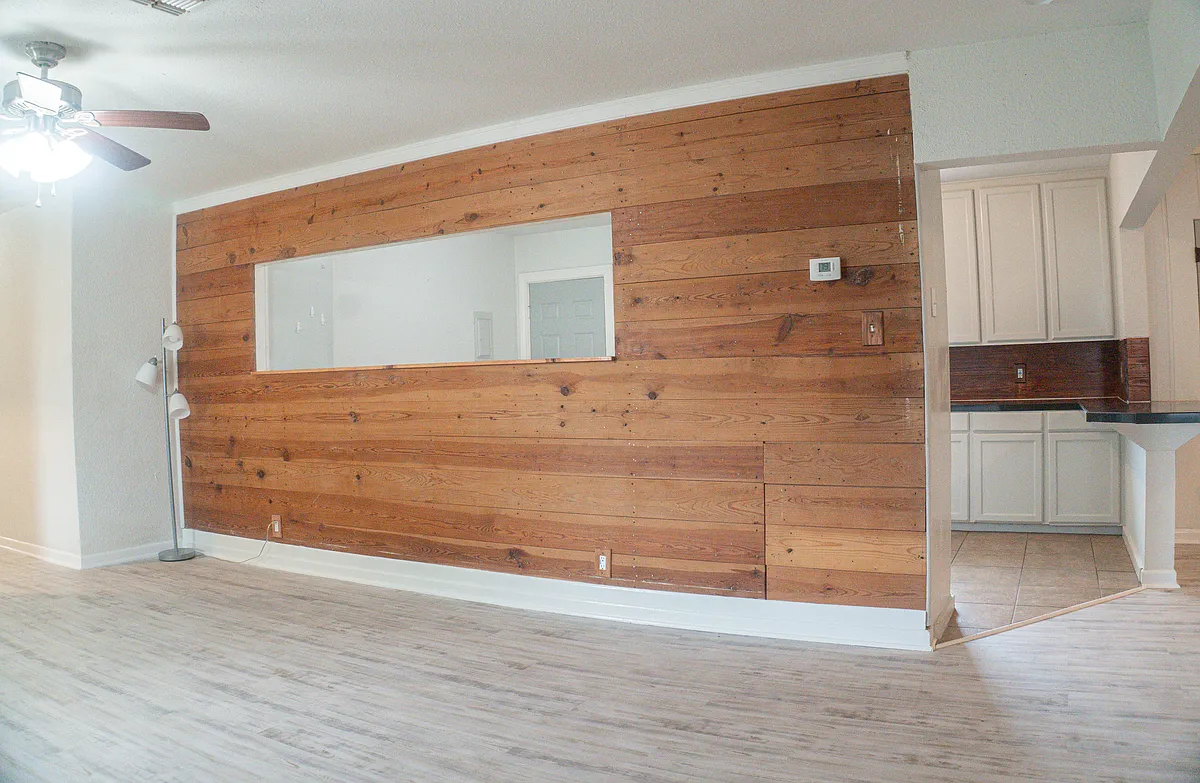 Living Room upon front door entry. Original shiplap! - 5934 S Alameda St