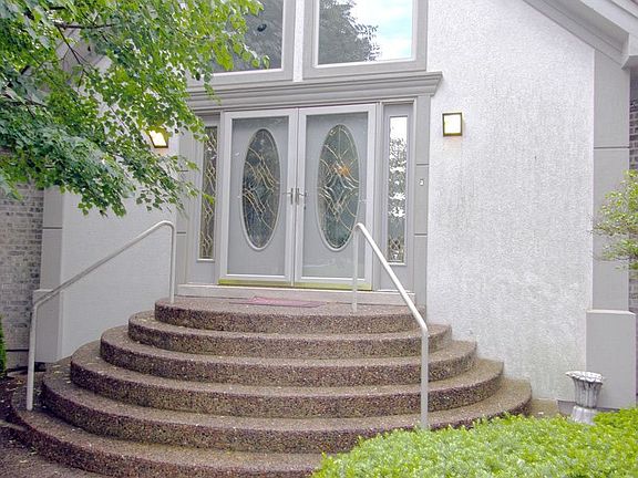 Alternative View of Ranch with Long Drive Way Leading to 3 Car Garage