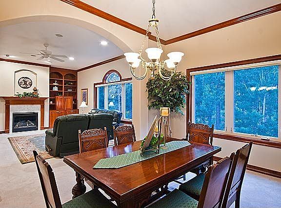 Separate formal dining room boasts 2 built-in buffet & china cabinets