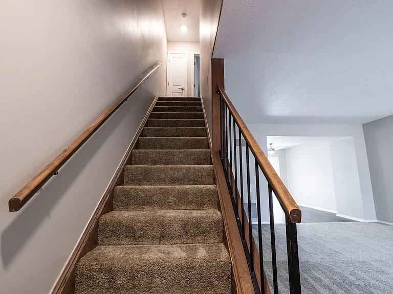 Stairway in the Two Bedroom Townhome at Woodbridge Bloomington