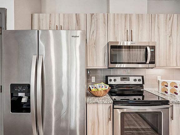 4th image of 12501 Honore Ave #112