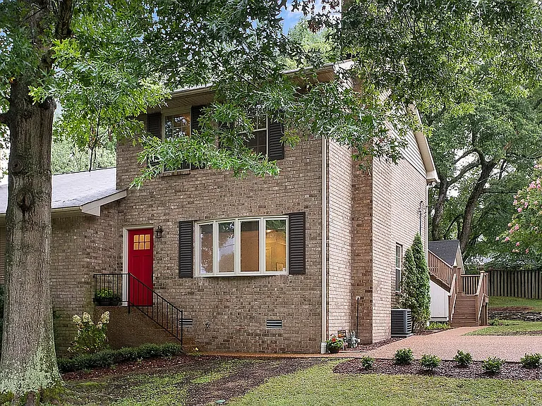 Outside of home with room for two cars