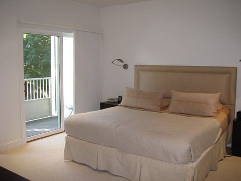 master bedroom with balcony