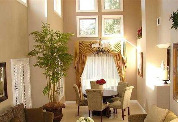 Living room with vaulted ceilings.