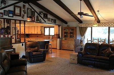 Living area looking toward dining and kitchen.