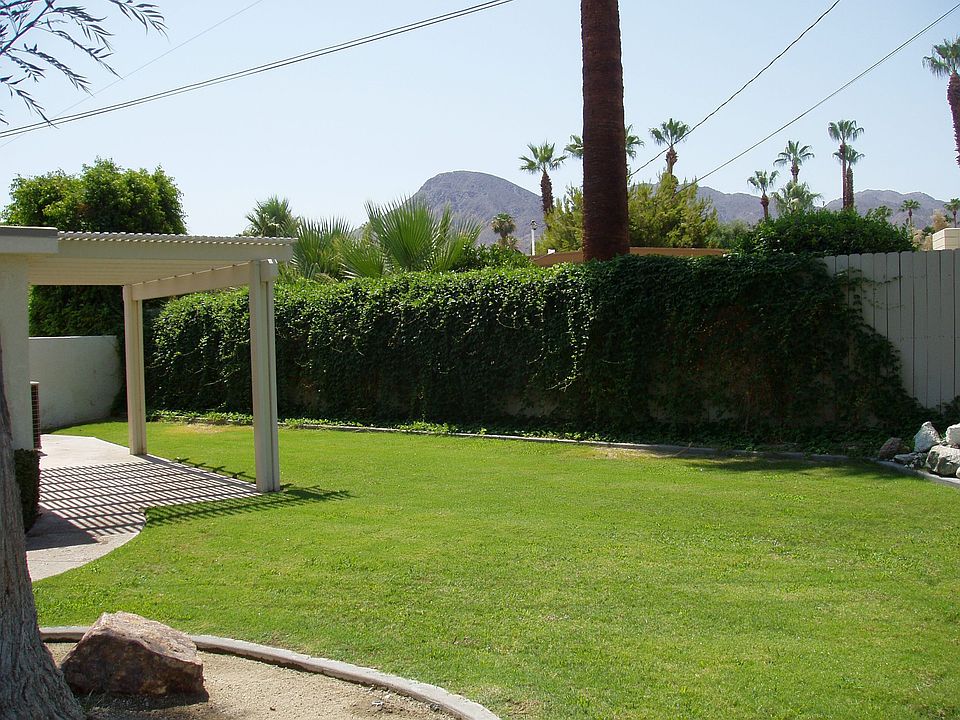 Side of backyard with patio cover