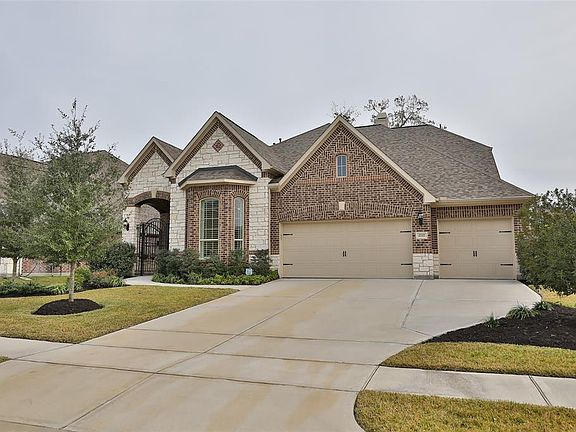 Lovely stone elevation with a full 3 car garage