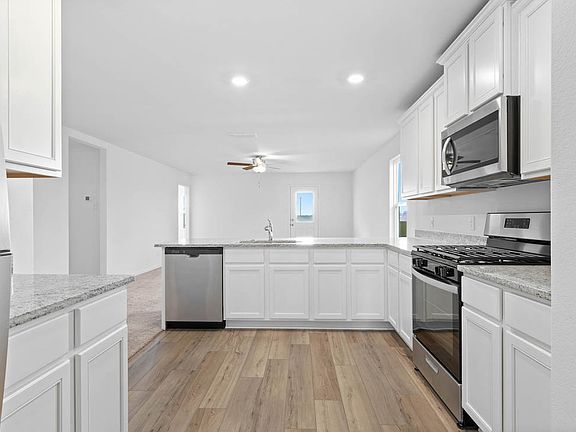 The spacious kitchen is perfect for preparing your family s favorite meals and treats.