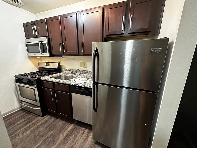 Kitchen featuring granite countertops and stainless steel appliances