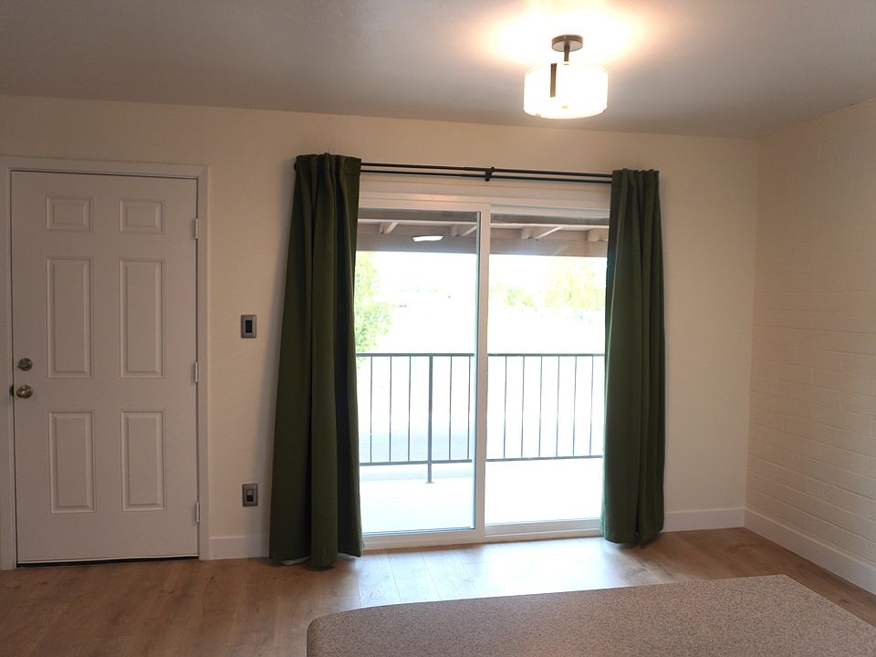 Front door, dining area overlooks park.