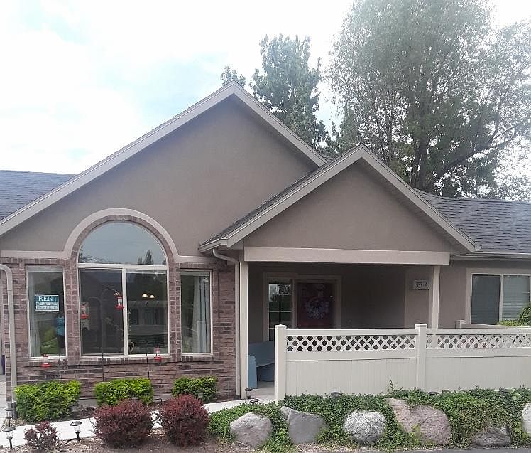 View of entrance with covered patio.