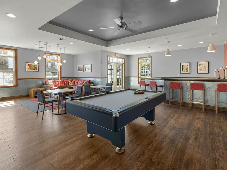 Socialize and unwind in the game room with a pool table at The Quarters, student apartments near UL Lafayette.