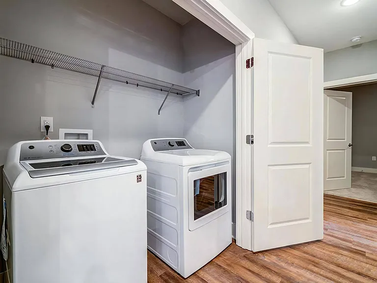 In-Unit Washer and Dryer with Overhead Storage Shelf