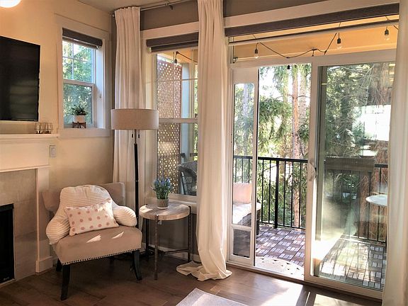 Secluded balcony backs up to beautiful trees. Squirrels and birds live in the woods. One bird seemingly took occupancy in a hanging flower basket.