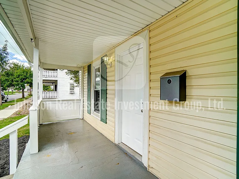 Enjoy this spacious front porch.