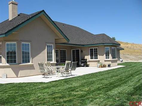 Large patio area, with kitchen located thru the sliding doors.